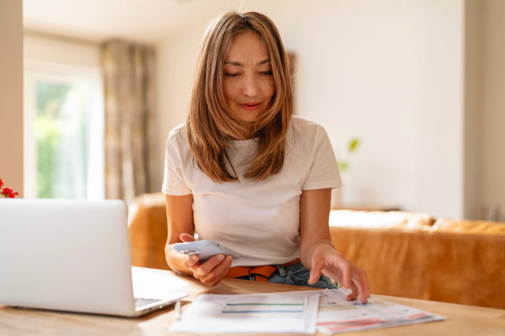 woman going over financial documents